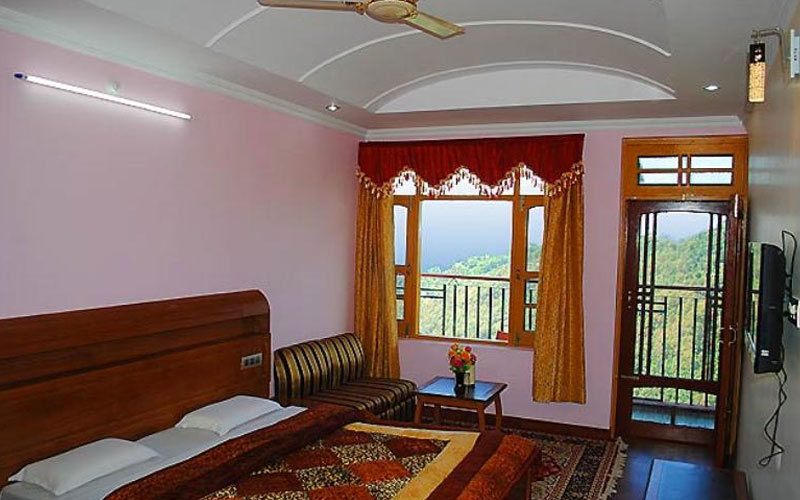 In a hilltop village with views to the Himalayas and the Kangra Valley, this relaxed hotel is within a 7-minute walk of both the Tibet Museum and the Dalai Lama's main temple.